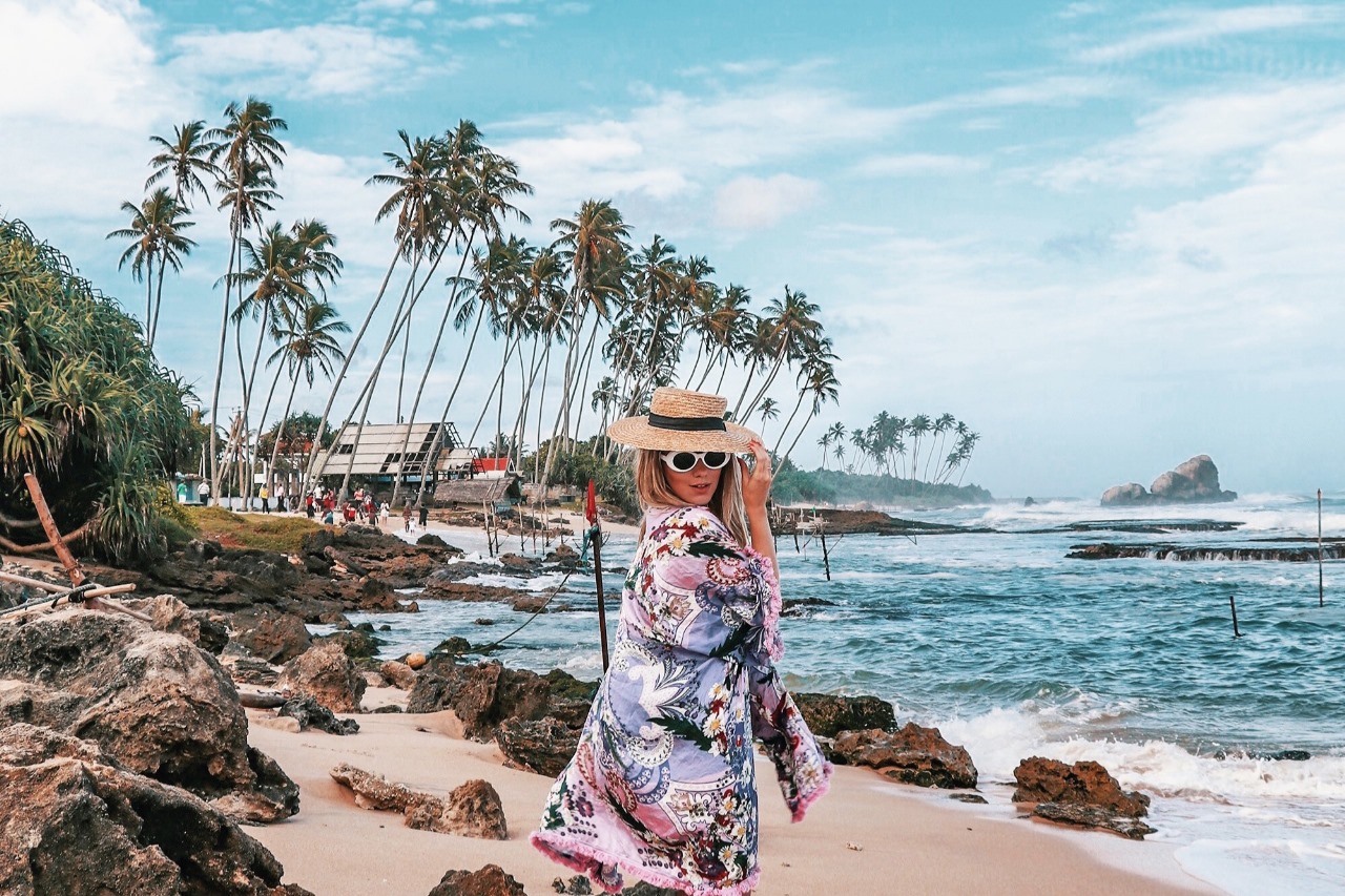 woman enjoying a scenic Galle beach