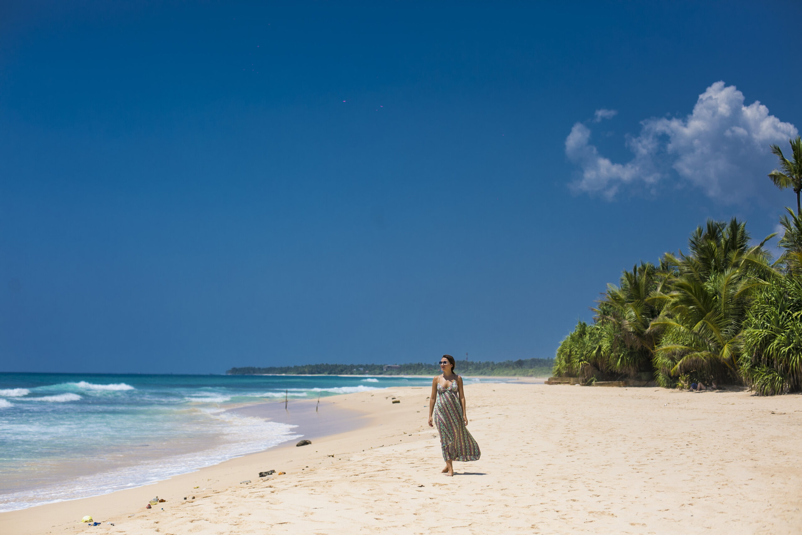 Relaxing stroll by the beach at The Fortress, one of the best beach resorts in Galle, Sri Lanka
