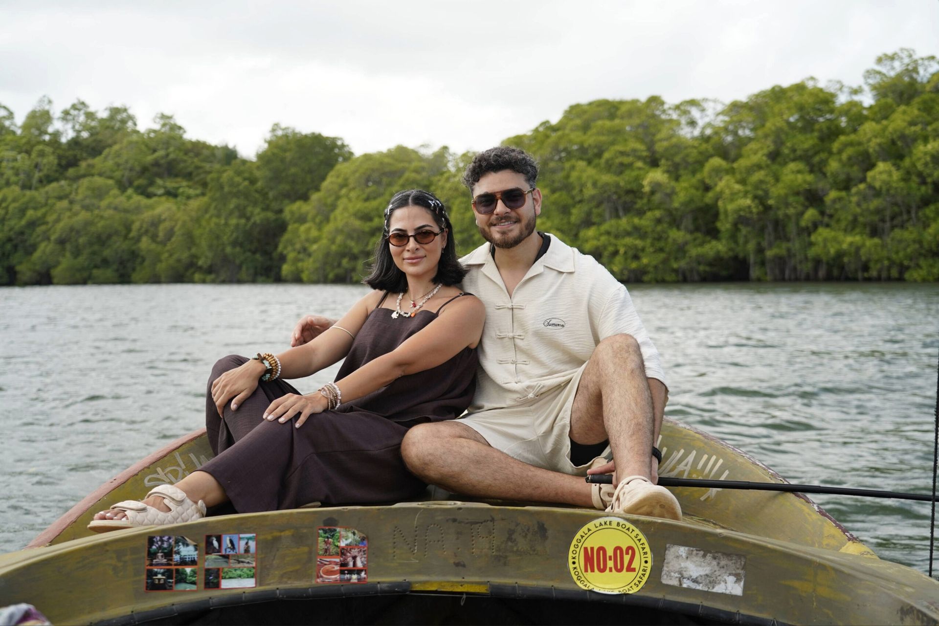 Couple enjoying a boat experience on Koggala Lake near Galle, Sri Lanka